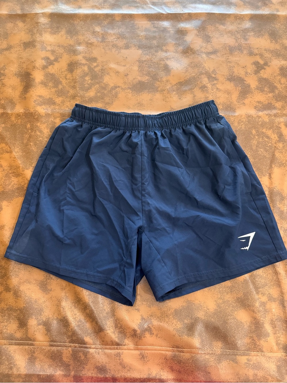 Gymshark Navy Blue Athletic Shorts with White Logo